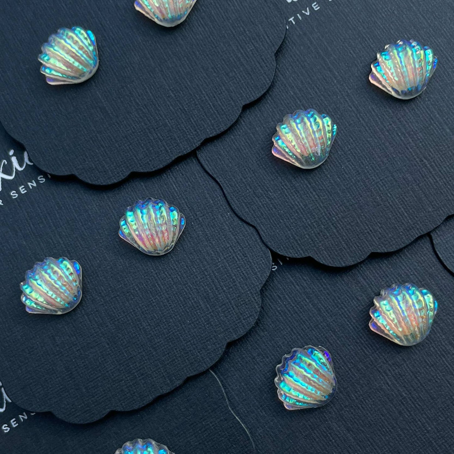 Seashells in Iridescent Ripples